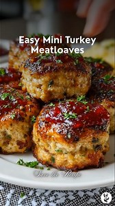 These Mini Turkey Meatloaves are cozy, comforting, and made with lighter ingredients you can feel good about. Juicy, flavorful turkey topped with a sweet-tangy glaze delivers all the comfort of classic meatloaf in perfect little portions. Warm, nourishing, and family-friendly this is comfort food done right. Ingredients • 1 tablespoon butter • 1 yellow onion, finely diced • 3 cloves garlic, minced • 1 tablespoon fresh thyme, minced • 2 lb 93/7 ground turkey • 2 eggs, lightly beaten • ½ cup seaso