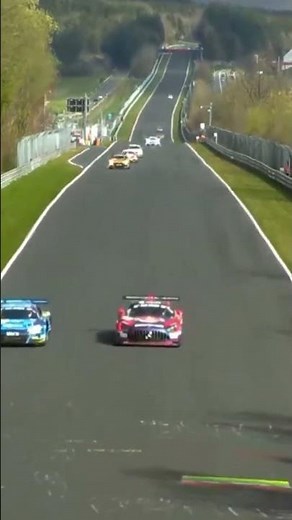 Max Verstappen passes for the lead at Nurburgring