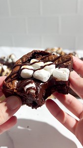 🍫🌶☕ Mexican Hot Chocolate Brownies infuse rich, fudgy brownies with the warming flavors of Mexican hot chocolate. Chocolate, cinnamon, and a subtle hint of cayenne are balanced by a silky chocolate ganache and toasty marshmallow topping. Recipe: handletheheat.com/mexican-hot-chocolate-brownies | Handle the Heat