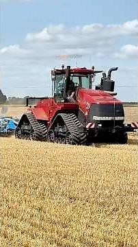 Case 500 Quadtrac tractor with the Farmet Fantom on working stubble after harvest