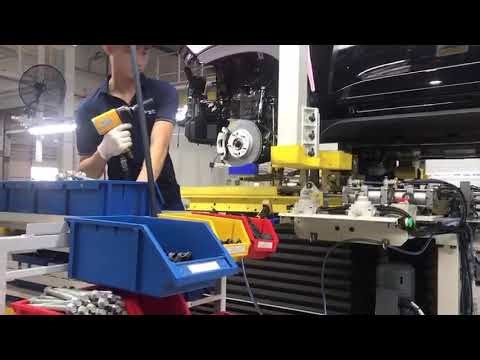 Engine, Transmission & Subframe Installation onto the Car Body | Inside Auto Factory