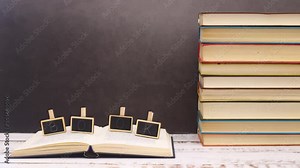 Book title moving on opened book - Stop motion