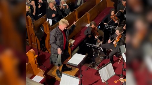 Video of the Day: Guest conductor gives lively performance while leading orchestra