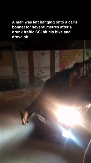 In a shocking incident from Tirunelveli, Tamil Nadu, a traffic SSI rear-ended a commuter’s bike and, after a heated argument, drove off with the man clinging to his car bonnet. [Tamil Nadu, Tirunelveli, Viral Video] #TNTrendingNow | TIMES NOW