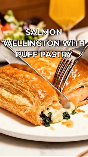 Salmon Wellington with Puff Pastry Flaky salmon wrapped in golden puff pastry warm, creamy, and the kind of dinner that feels truly special. There’s something so comforting about this dish. The pastry turns crisp and buttery, the salmon stays tender, and that creamy spinach filling melts into every bite. Elegant without being fussy perfect for a calm weekend dinner or any night you want a restaurant-style plate at home. Save this for a cozy night when you want seafood that feels a little fancy �