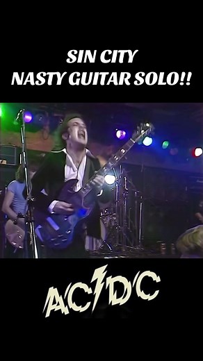 Angus Young's Epic Guitar Solo Performance
