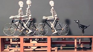 3 skeleton cyclists being chased by a dog - it's called an automata and it's a great mix of woodworking, mechanics, and storytelling of a common bicycle situation. VIDEO WITH SOUND: http://snip.ly/9KhO #cycling #automata #woodworking #bicycle #dogchase | BikeRoar