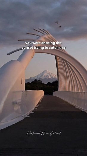 Worth the chase! This is Te Rewa Rewa Bridge located in New Plymouth, Taranaki, part of the New Plymouth Coastal Walkway. 🐳 Its arch is designed to resemble a whale skeleton and a wave, creating a symbolic connection to nature. 💡Named in Māori as Te Rewa Rewa, meaning "to float away". 🏔 It’s perfect for walking, cycling, and capturing postcard-worthy photos of Mount Taranaki framed through the bridge. 🌅 The way the arch frames the mountain makes it a favorite for sunrise and sunset photograp