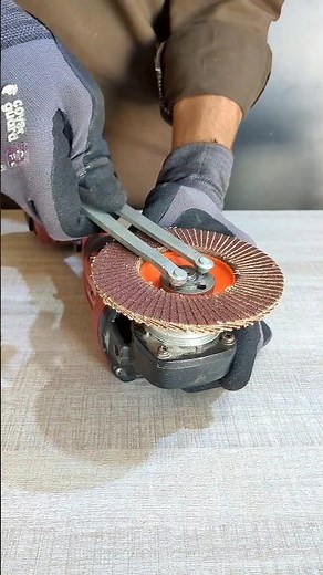 Sharpening the drill bit with an angle grinder