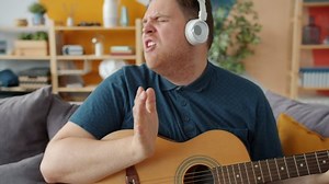 Creative Guy Expressive Face Playing Guitar Stock Footage Video (100% Royalty-free) 1044790723 | Shutterstock