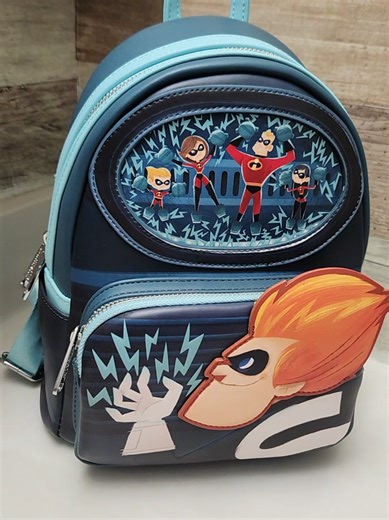 Only one left. Loungefly Disney The Incredibles mini backpack. vegan faux leather backpack with adjustable straps, printed interior with pockets. glows in the dark too! There's only one left, so click the link in the video now to order. #loungefly #Disney #pixar #incredibles #fyp