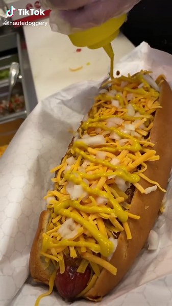 🌭 Did you know that you can get any of our hot dogs and upgradeded into a footlong? Here we are putting the finishing touches on our Detroit Coney footlong style! #hotdog #nationalhotdogday #hotdogs #food #foodtiktok #foodie #hotdogs