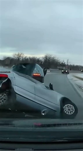 SUV Falls From Car Carrier, Slides on Roof Toward Dashcam 🚗❄️