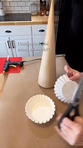 This adorable Christmas diy is definitely one you’ll want to save! So easy, inexpensive and absolutely the cutest! All you need is a cone shape (I used paper mache here, but any foam, cardboard etc… cone shape will work fine) and some fun, festive paper cupcake liners. Cut the bottom out of the liners, and using only the ruffled sides, hot glue the strips onto your cone shape, layering as you go up. Make it whimsical, and quirky or more refined. Have fun and use different cupcake liners and diff