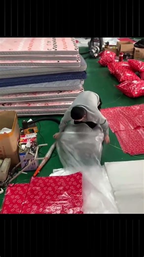 man uses air compressor to pack the bed