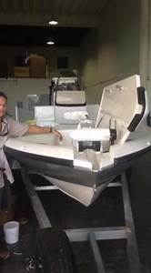 The stow away trolling motor with self deploy on the Intrepid 20 Flats boat. | Intrepid Powerboats