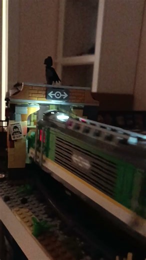 Green cargo train exiting from the train engine shed #legotrains