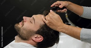 Man getting his hair wash Stock Video