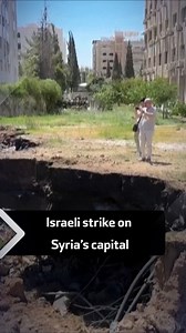 Images show charred cars and a large crater caused by an Israeli strike on the residential neighborhood of Kafr Sousa in Syria's capital Damascus. | Al Arabiya English