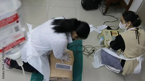 Emergency and first aid class on cpr doll, Cardiac life support