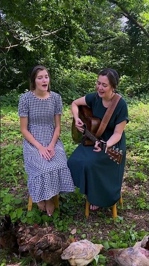 Trina & Kari singing Sheltered in the Arms of God