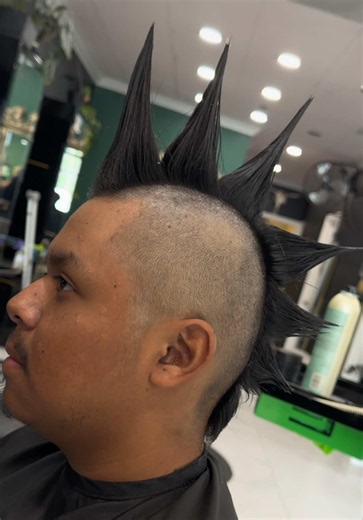 Mohawk with liberty spikes using good ol fashioned @got2b glue & freeze spray . . . . . . . . . . . . . . . . #mohawk #libertyspikes #punkhair #althair #althairstylist