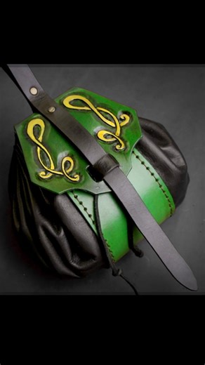 Watch as I make a Drawstring Pouch / Dice Bag. You can find the Full Length Tutorial Video and Pattern in the first comment down below. #darkhoseworkshop #leathercraft #leathercarving #leatherpouch #leatherpattern #pouchpattern #leathertooling #knotwork | Dark Horse Workshop