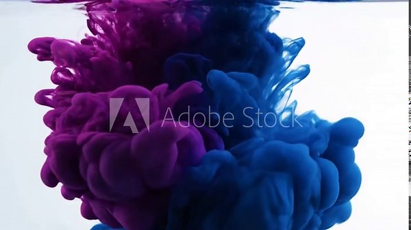 Color Explosion: A captivating dance of vibrant hues, where a cascade of indigo and purple ink intertwines, creating an abstract spectacle of color and form, igniting the imagination.