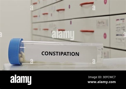 CONSTIPATION treatment tablets used to relieve bowel obstruction and improve stool passage Stock Video Footage - Alamy