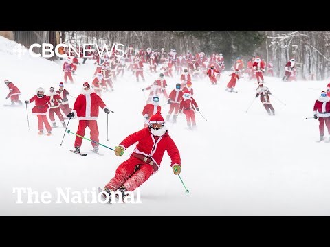 #TheMoment hundreds of skiing Santas hit the slopes