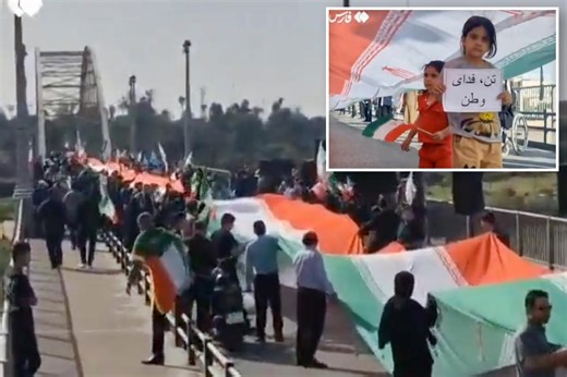 Iran’s youth form human chains around power plants after Trump warns of ‘complete demolition’