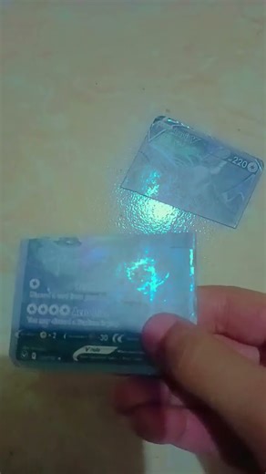 Pokemon lugia card is cutting 😱😱😱😱😱