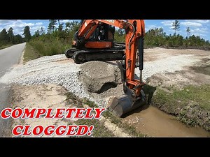 CULVERT CLUSTERF**K! Installing Culvert Rip Rap and Unclogging A Culvert Pipe!