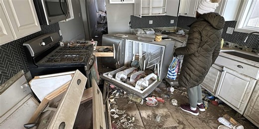 A Final Walkthrough: McCook Lake resident visits flood-ravaged home one last time before it’s demolished