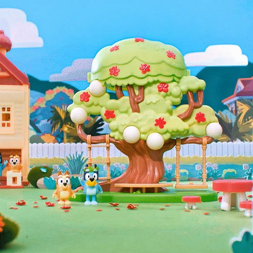 The poinciana tree is in bloom! Recreate all of Bluey's backyard adventures with the feature packed Bluey's Tree Playset. | Bluey