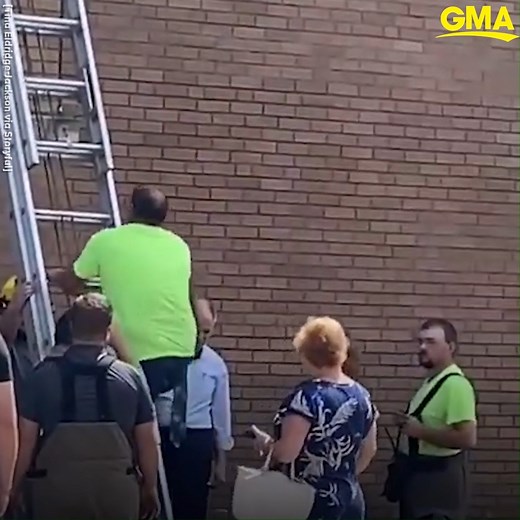A video shows country singer Reba McEntire climbing down from a historic building in Atoka, Oklahoma, where she and her partner were left stranded on the second floor after the staircase collapsed. https://gma.abc/399pRzy | Good Morning America