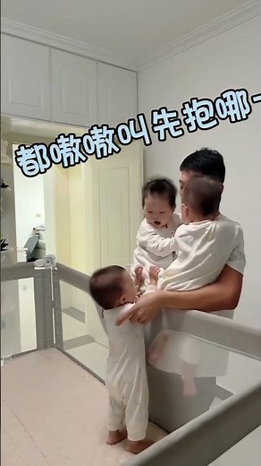 A Loving Moment Dad Carries His Triplets Together #Triplets #DadLife #Parenting