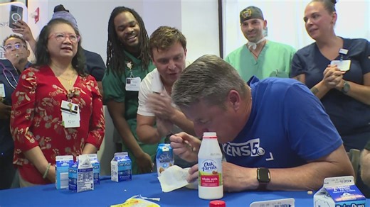 Nate Ryan and Bill Taylor compete in cereal eating contest