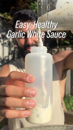 How to make the best Creamy Garlic White Sauce in 5 minutes! It’s easy to prep, lower in calories and great with any meal! 👇🏼 - - 1/2 cup fat free greek yogurt, plain 1/2 cup light mayo / miracle whip Squeeze of 1 lemon 6-8 garlic cloves, minced 1 tbsp vinegar 1 tbsp honey (or any sweetener) 1/4 tsp salt 1/4 tsp pepper Optional: 1/4 cup finely chopped cilantro (or parsley) Optional: 1/4 tsp cumin - Notes: • Store your sauce in a container or squeeze bottle in the refrigerator. It will last as 