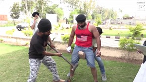 This man gets smashed in the testicles by a sledgehammer and doesn't flinch