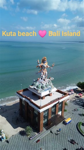 An iconic statue standing tall on the shores of Kuta Beach, Bali – the statue of Dewa Baruna, the ruler of the seas. 🌊✨ Representing the God of Water, he symbolizes balance in nature, the mighty power of the ocean, and protection against evil spirits. A reminder of Bali’s deep spiritual connection with the sea and its eternal harmony with nature. #KutaBeach #BaliIsland #DewaBaruna #OceanSpirit | Galih Bali Tour - Bali Driver and Guide