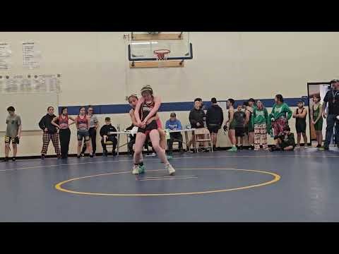 8th grade wrestling season. Audrie in the green singlet. 1/23/2025