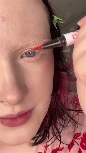 Learning graphic eyeliner as a blind girl with albinism