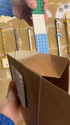 Box + Bricks = Cello? Playing "Waltz No. 2"?