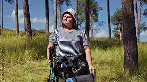 Bold Steps A Plus Size happy Woman Hiking Odyssey Through Nature