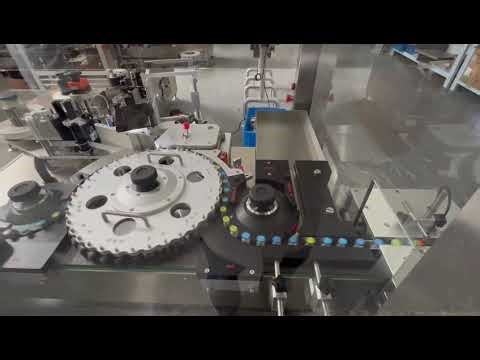 Automatic high speed vial labeling machine