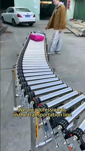 A chain-driven, powered roller conveyor line—fully retractable, capable of turning corners