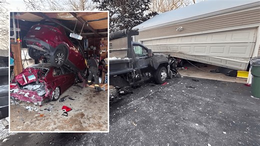 VIDEO: Snowplow crashes through cars and into garage, stacking vehicles atop each other