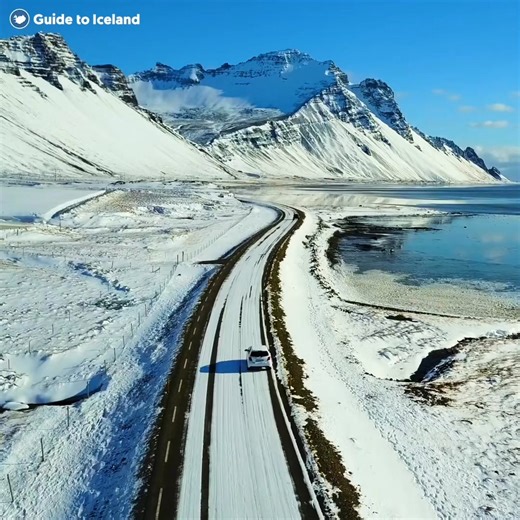 Standing on the Stokksnes Peninsula, Mount Vestrahorn is unlike any other peak in Iceland! 🏔️🇮🇸 Made of iron- and magnesium-rich gabbro rock, its dark, craggy slopes make it a must-see for adventurers and photographers alike. 🤩✨ | Guide to Iceland