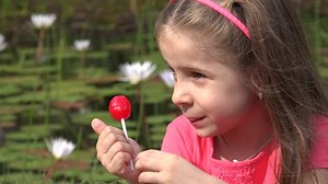 Toddler Girl With Lollipop